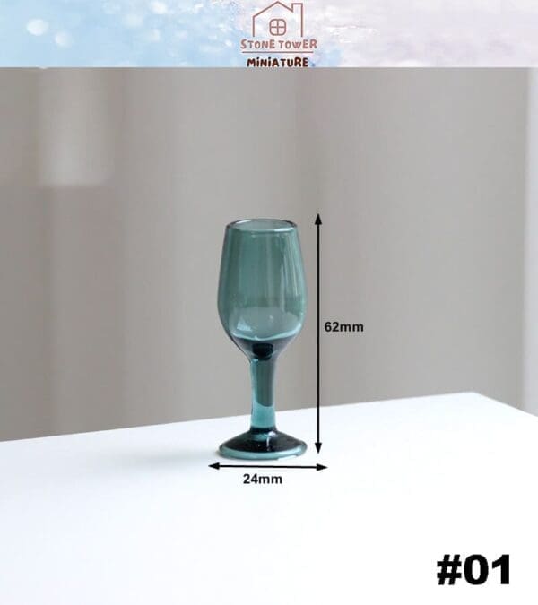 Miniature glass goblet on a white surface, with dimensions 62mm height and 24mm width shown.