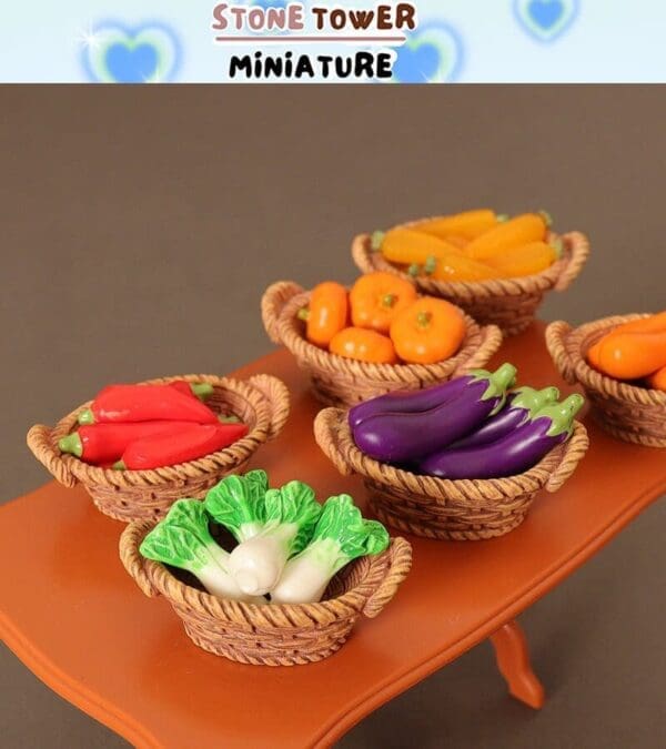 Miniature baskets of colorful vegetables, including eggplants, peppers, and greens, on a small table.