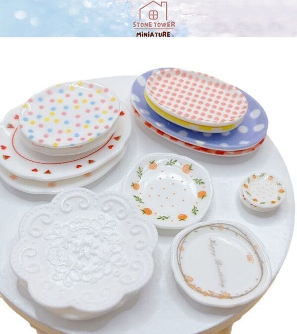 Miniature ceramic plates with colorful patterns on a white surface, including polka dots, florals, and embossed designs.