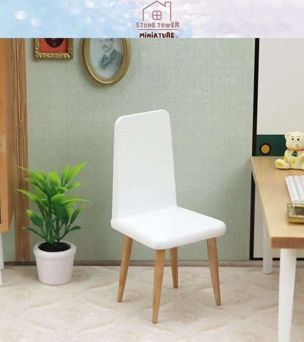 Miniature white chair with wooden legs next to a potted plant in a dollhouse room setting.