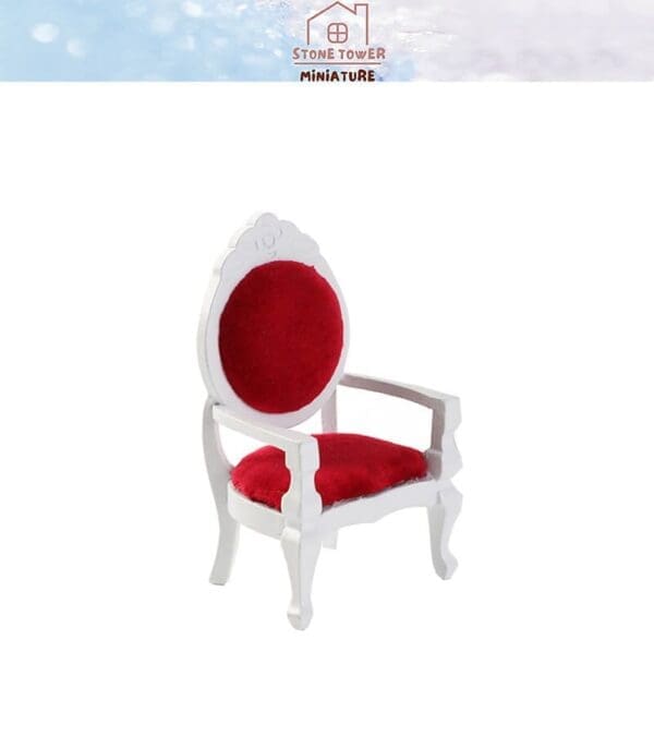 White miniature chair with red velvet seat and backrest, set against a plain white background.