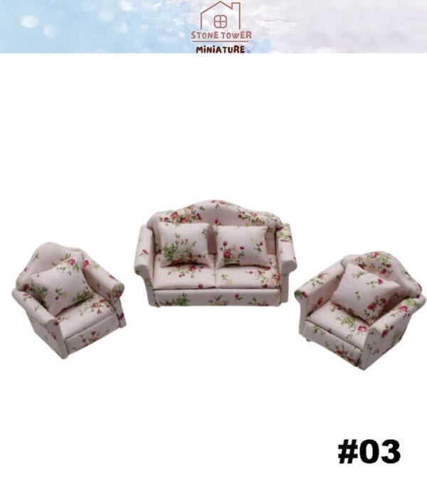 Floral-patterned miniature sofa set with two armchairs and a loveseat on a white background.