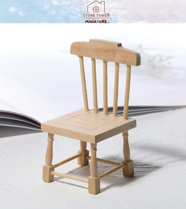 Wooden miniature chair on a light background, with "Stone Tower Miniature" logo above.