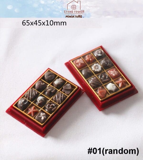 Miniature chocolate boxes with assorted designs in red trays, measuring 65x45x10mm, labeled #01(random).