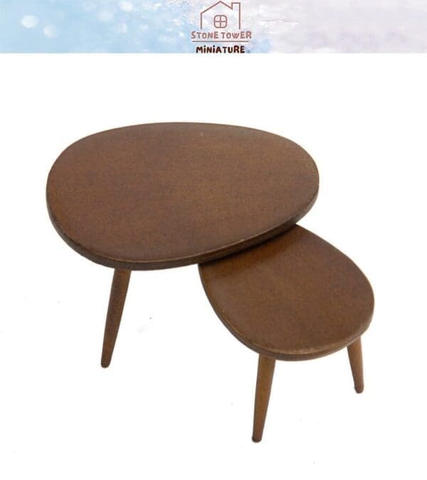 Wooden miniature nesting tables with brown finish, featuring oval tops and slender legs, from Stone Tower Miniature.