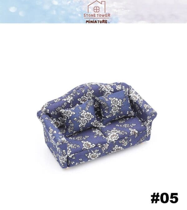 Miniature blue floral-patterned sofa with cushions, number 05.