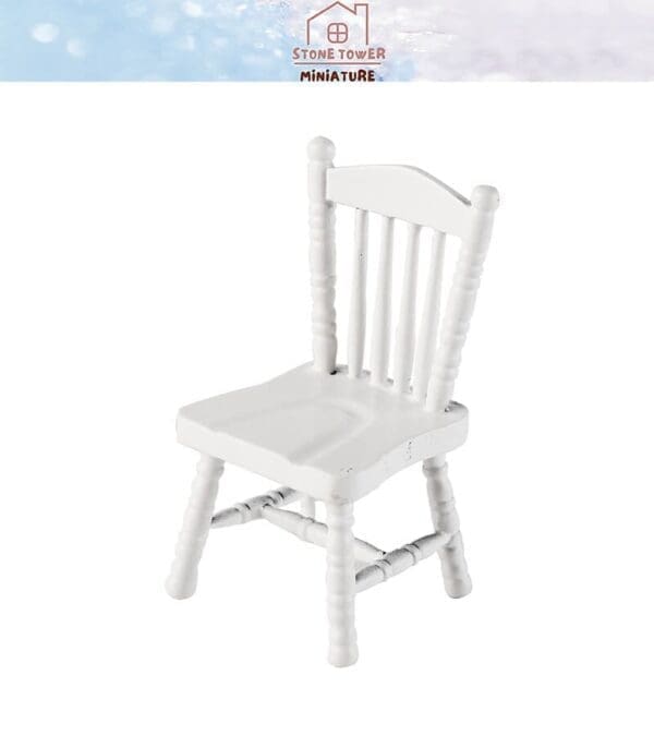 White wooden miniature chair with spindle backrest, showcased on a light background.