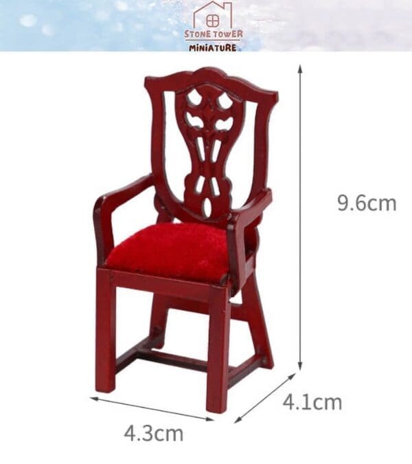 Miniature red chair with ornate back and red seat, measuring 9.6cm tall, 4.3cm wide, and 4.1cm deep.