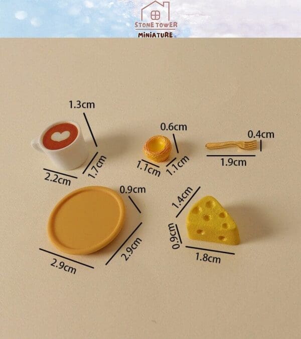 Miniature breakfast set with coffee, pastry, fork, plate, and cheese, labeled with measurements.