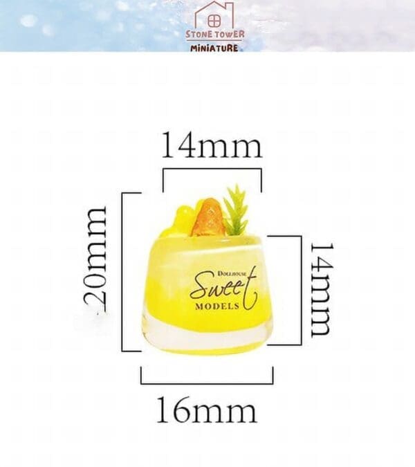 Miniature dessert model with yellow jelly, fruit garnish, and "Sweet Models" text. Dimensions: 20mm x 16mm x 14mm.