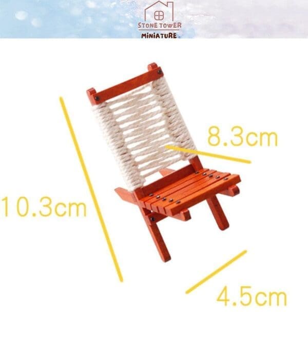 Miniature wooden chair with a rope backrest, measuring 10.3cm high, 8.3cm wide, and 4.5cm deep.