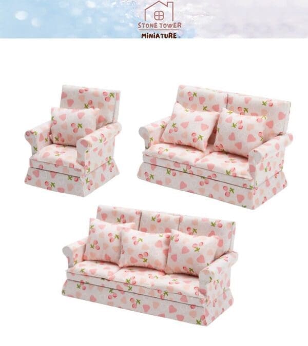 Miniature sofa set with pink heart and fruit pattern, including a chair and two sofas, by Stone Tower Miniature.