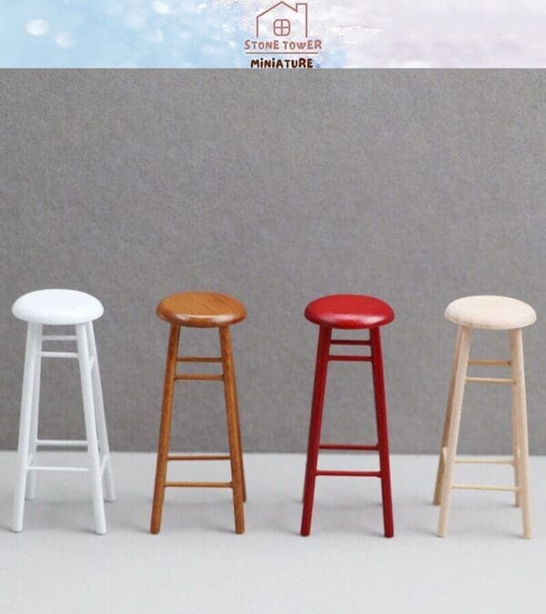 Four miniature stools in white, brown, red, and beige against a neutral background.