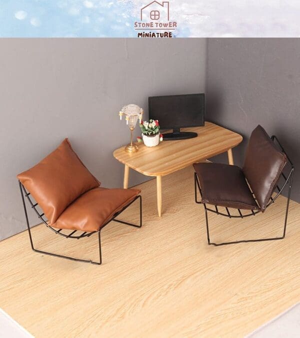 Miniature modern living room set with two brown chairs, a wooden table, a small TV, a lamp, and a flower vase.