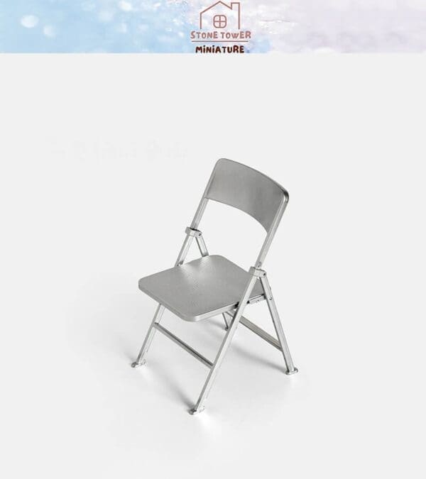 Silver miniature folding chair on a white background, with "Stone Tower Miniature" logo above.