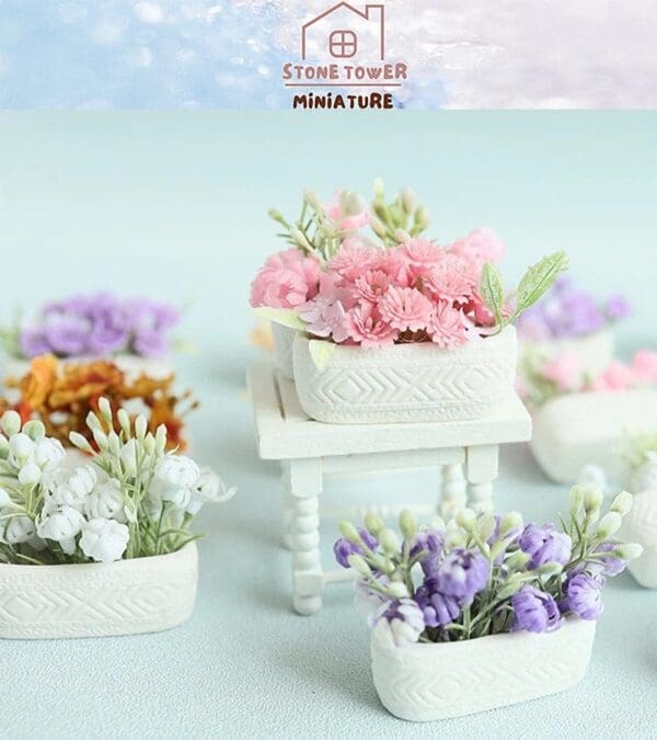 Miniature floral arrangements in white baskets on a small white table, featuring pink, purple, and white flowers.