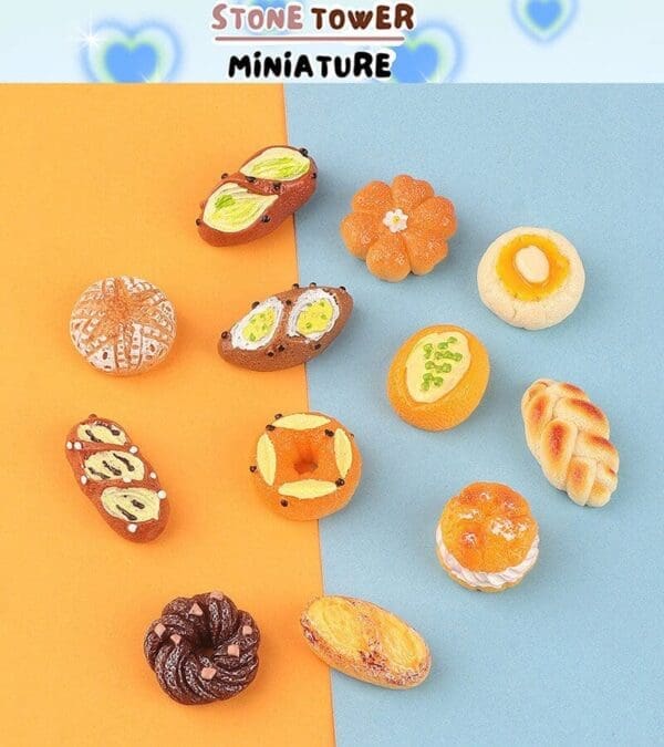 Miniature bread and pastry replicas arranged on a split orange and blue background.