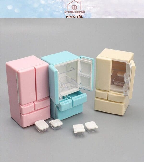 Three miniature fridges in pink, blue, and yellow with open doors, featuring tiny containers in front.