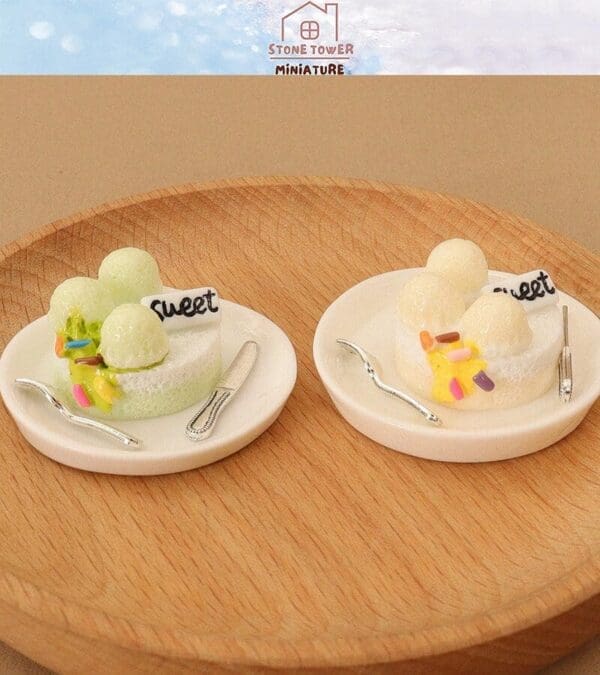 Miniature desserts on wooden tray with "sweet" labels, sprinkles, and tiny utensils on white plates.