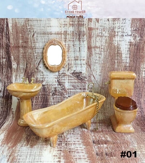 Miniature vintage-style bathroom set with tub, sink, toilet, and mirror on a rustic wood backdrop.